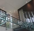 Стеклянные полы на площадке маршевой лестницы в Ростове-на-Дону. Готовые проекты ПерилаГлавСнаб - фото 1